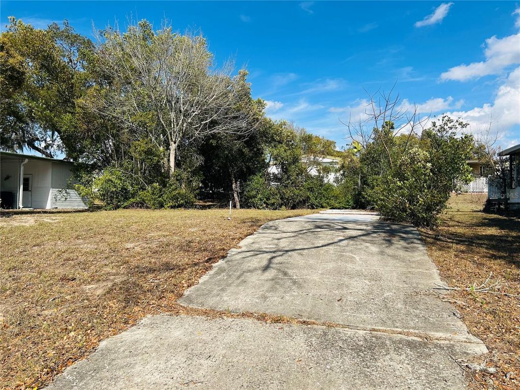 Photo of 7386 First Circle Drive, Brooksville, FL 34613 (MLS # W7883261)