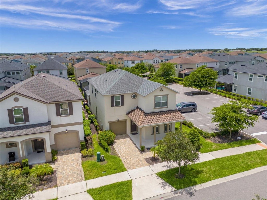 Photo of 9012 Egret Mills Terrace, Kissimmee, FL 34747 (MLS # O6432316)