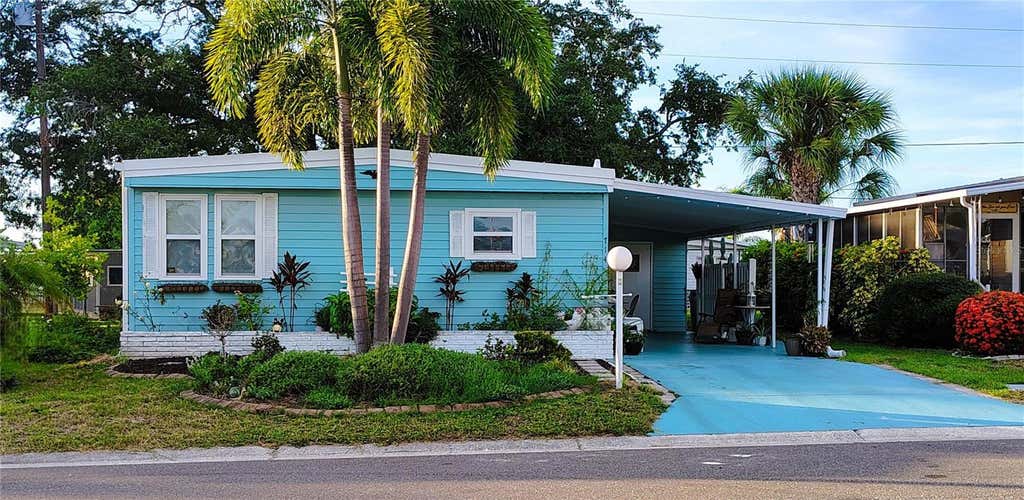 Photo of 714 48th B Avenue E, Bradenton, FL 34203 (MLS # O6419575)