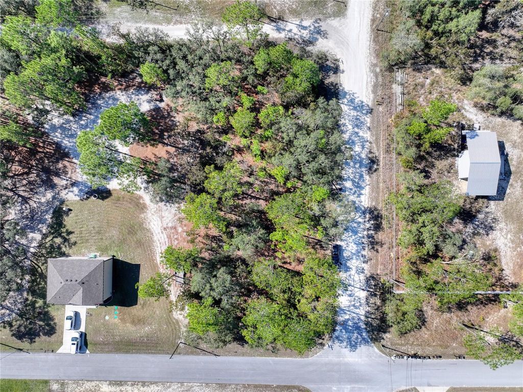 Photo of 10484 Snowbird Avenue, Weeki Wachee, FL 34614 (MLS # TB8439790)