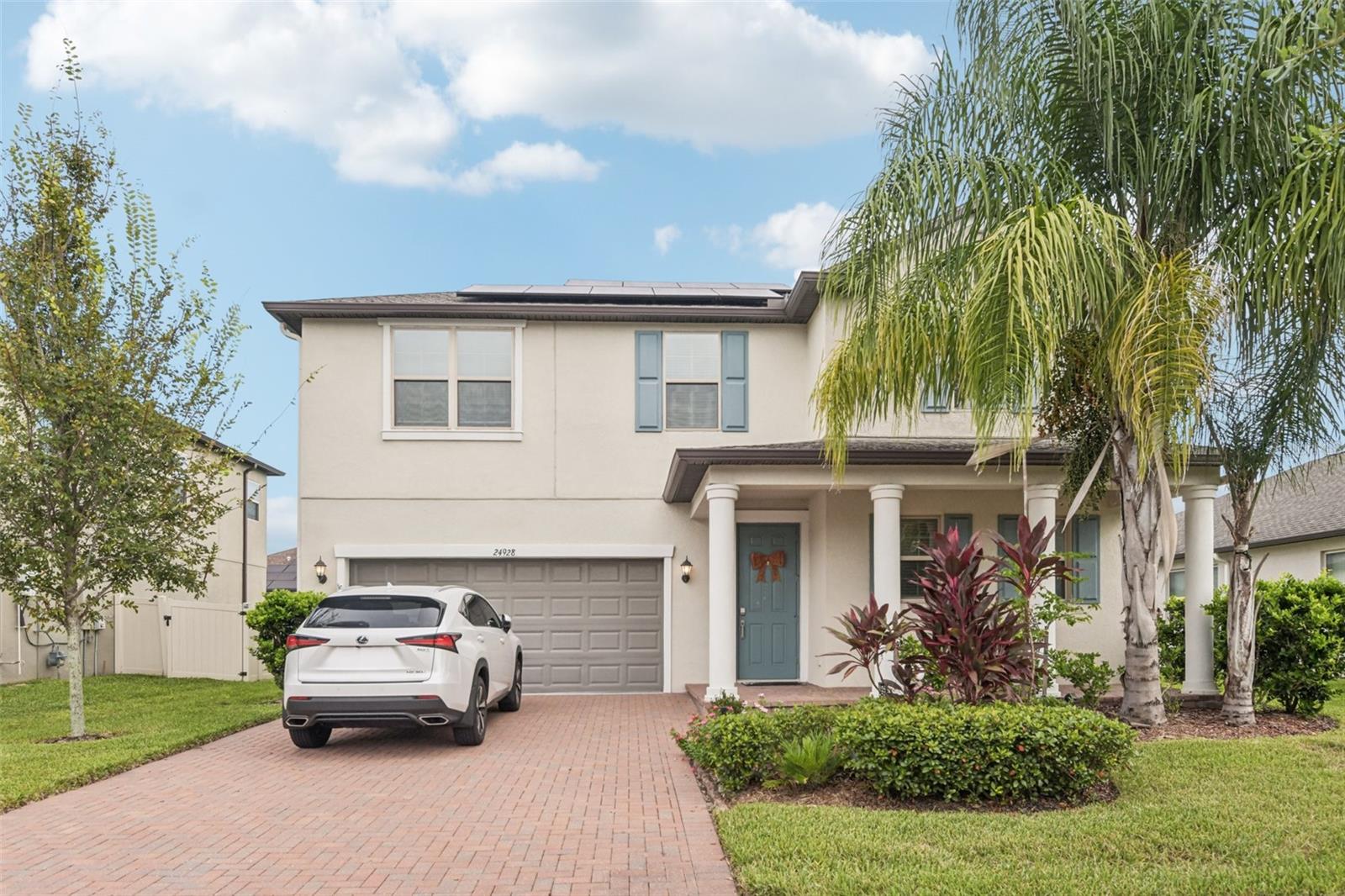 This beautifully designed 2,533 sqft home in the sought-after Briarwinds community of Lutz combines comfort, energy savings, and unbeatable convenience. Just minutes from Tampa Premium Outlets, Costco, Publix, and a wide range of dining options, the home also offers quick access to I-75 and I-275, making commutes around Tampa Bay a breeze. Built in 2020, the two-story Rhode Island floor plan features an open-concept layout with abundant natural light, a private first-floor master suite, and a spacious upstairs loft connecting the secondary bedrooms—perfect as a media or game room. The solar system keeps the average monthly electric bill under $100, giving you exceptional efficiency and savings. Thoughtful upgrades include gutters, a screened lanai, whole-house water softener, reverse osmosis water filtration in the kitchen, and a Ring alarm system. With modern features, prime location, and easy highway access, this move-in ready home is a rare find you don’t want to miss.