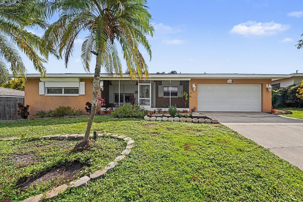 Photo of 1945 Souvenir Drive, Clearwater, FL 33755 (MLS # TB8554018)