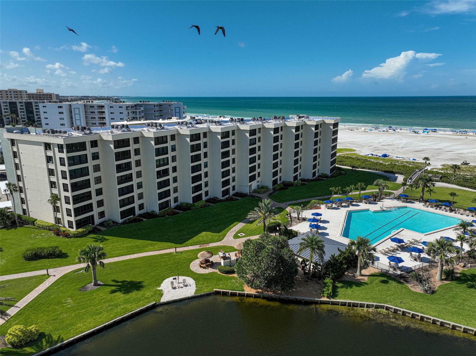 Welcome to the Gulf & Bay Club. Here you will experience the ultimate in coastal living with this luxury, maintenance-free beachfront condo located directly on world-renowned Siesta Beach in Sarasota, Florida. This fully renovated 2-bedroom, 2-bathroom residence showcases designer finishes and top-of-the-line appliances, offering a seamless blend of modern elegance and relaxed beachside comfort.
Enjoy breathtaking sunset views from your living room and take advantage of exclusive beach access just steps from your door. Inside, the open-concept layout is flooded with natural light, highlighting custom cabinetry, sleek countertops, and spa-like bathrooms. Set within a 24-hour gated community, this residence provides resort-style amenities including 2 heated pools, a clubhouse, state-of-the-art fitness center, tennis courts, pickleball courts, and so much more. Whether you're seeking a full-time home or seasonal retreat, this Siesta Key gem delivers unmatched luxury, privacy, and convenience—just minutes from fine dining, shopping, and vibrant downtown Sarasota. Live the beach lifestyle you’ve always dreamed of. Book your private showing today!