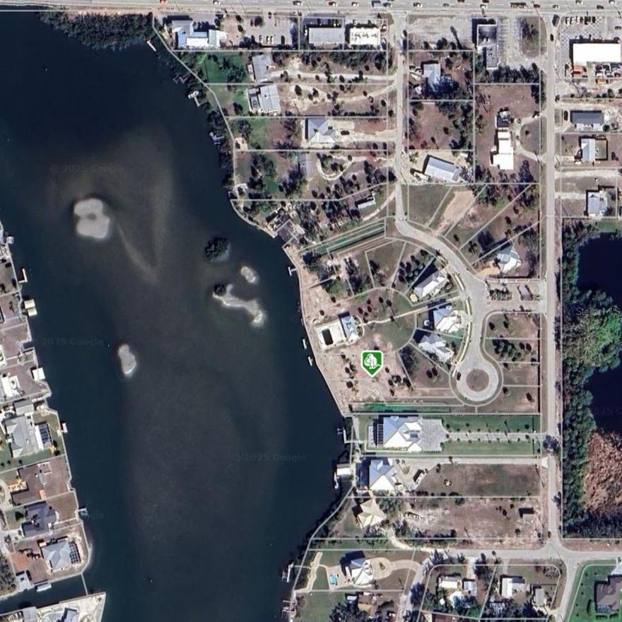 Lot #15 offers 91 feet of direct water frontage with stunning sunset views in the exclusive gated waterfront community of Mariner’s Landing in Englewood, FL. This one-of-a-kind property includes a private composite dock, a new seawall, and access to a resort-style heated cabana pool and community boat dock. Located on 6.5 acres along Lemon Bay, residents enjoy frequent sightings of dolphins and marine life, with direct access by boat, kayak, or jet ski to Ski Alley, Stump Pass Marina, The Lighthouse Grill, and the Gulf of Mexico. The lot features public water and sewer, with completed site infrastructure and deed-restricted HOA in place. Choose from a selection of approved builders offering a variety of home models and styles to suit your vision. With only three homes currently built, this is a rare opportunity for luxury waterfront living at its finest. Please see attached site plans.

Buyer and buyers agent to perform own Due diligence.