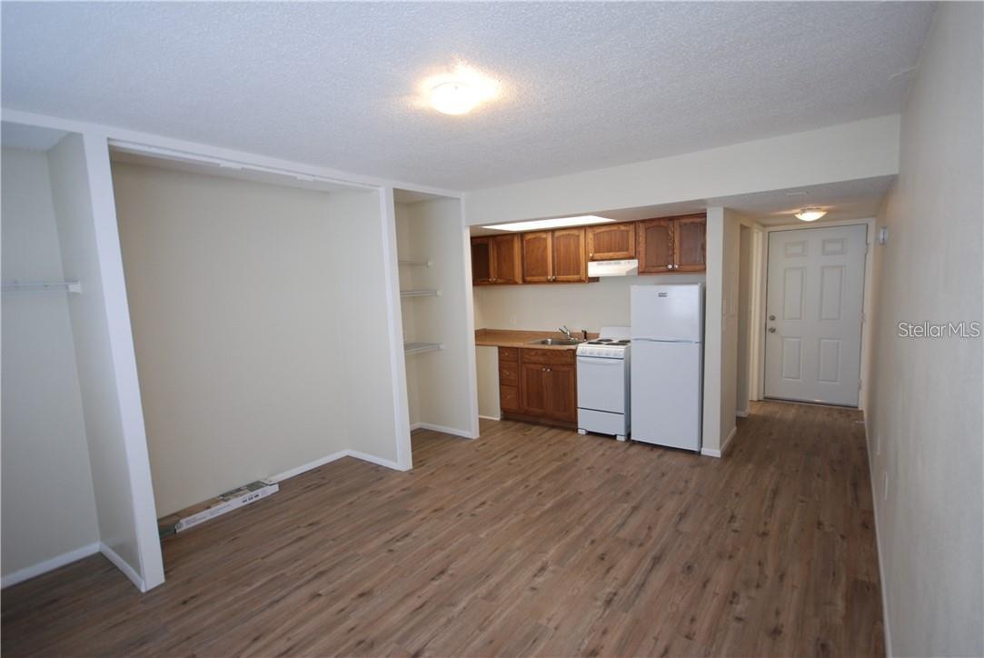 UNIVERSITY OAKWOODS II A CONDO - Residential Lease