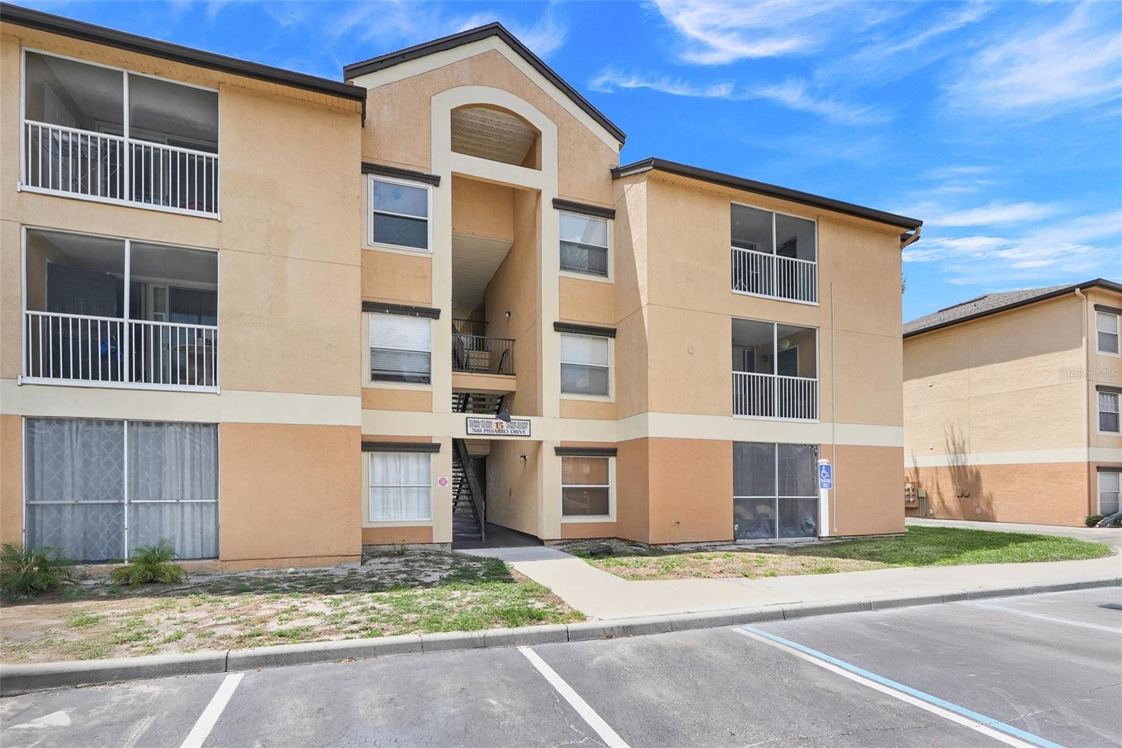 Prime investment opportunity in Dr. Phillips! This ground-floor 2-bedroom, 2-bathroom condo in the gated Sand Lake Private Residences community comes with a long-term tenant already in place—over 10 years of occupancy—providing immediate rental income and proven stability for investors. Offering more than 1,000 sq ft of thoughtfully designed space, the split floor plan includes two spacious primary suites, each with walk-in closets and private bathrooms. The living and dining areas feature laminate flooring, while the kitchen is finished with tile, stainless appliances, and a breakfast bar. A separate laundry room with washer and dryer is included for added convenience. Step out to the screened-in patio with relaxing water views of Big Sand Lake, and enjoy the rare bonus of an included 1-car garage. HOA fees cover water, sewer, and trash, plus access to extensive community amenities—two lakefront pools, a clubhouse with 24-hour fitness center, tennis, volleyball and basketball courts, dog park, playground, BBQ areas, and a private dock perfect for fishing, sunsets, and nightly Disney fireworks. Just minutes from Restaurant Row, International Drive, theme parks, Orlando International Airport, and major highways, this property offers strong rental demand in a prime location. A truly turn-key, income-producing condo ready for its next investor!