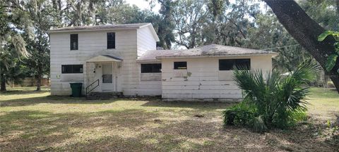 Photo of 242 Oak Hill Road, Lady Lake, FL 32159 (MLS # TB8319760)