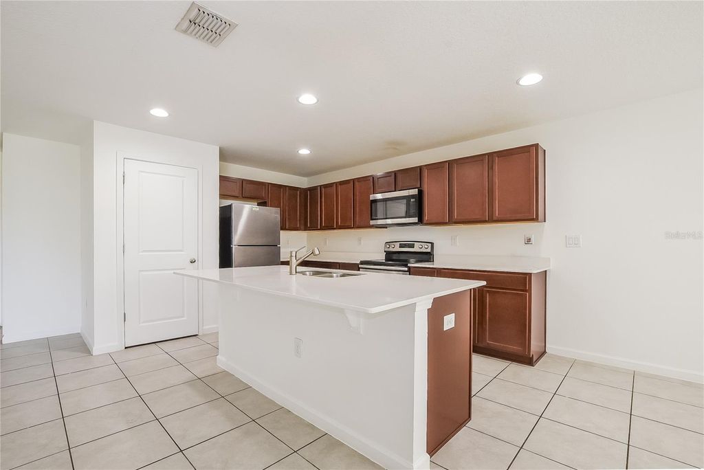 Photo of 1453 Lucerne Loop Road NE, Winter Haven, FL 33881 (MLS # TB8436674)