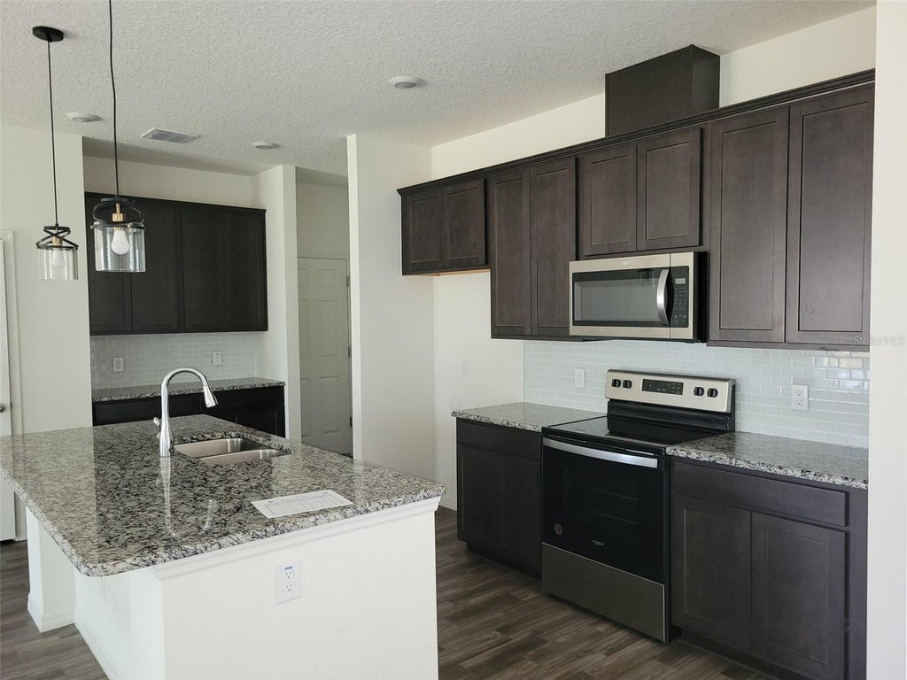 Photo of 780 Consumer Street SE, Palm Bay, FL 32909 (MLS # O6438840)