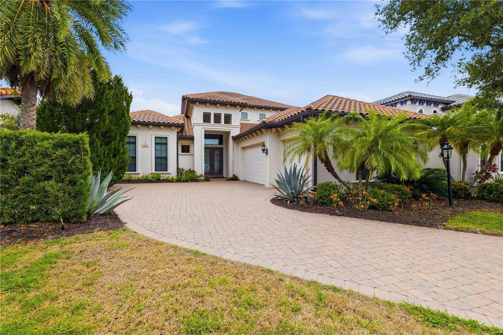 Photo of 7638 Windy Hill Cove, Bradenton, FL 34202 (MLS # A4695951)