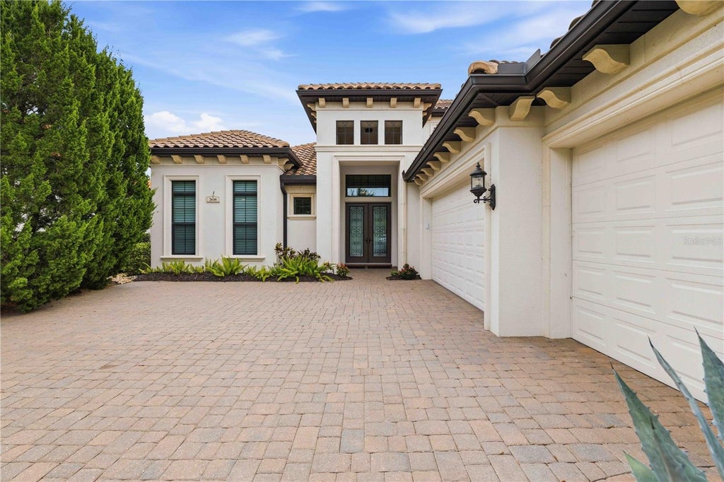 Photo of 7638 Windy Hill Cove, Bradenton, FL 34202 (MLS # A4695951)