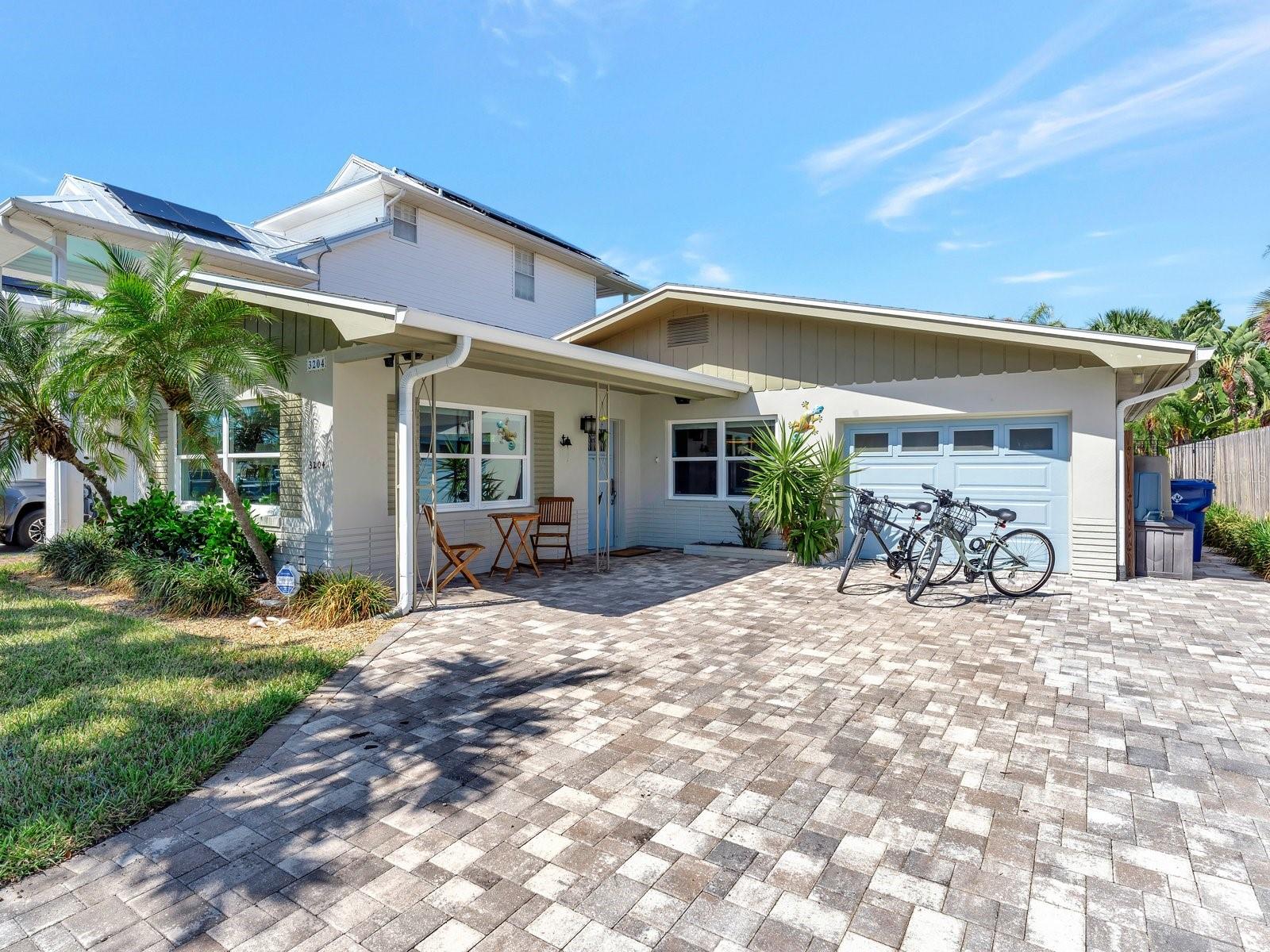 Nestled in the charming and highly desirable Don Ce-Sar Place neighborhood of St. Pete Beach, this beautifully maintained 2-bedroom, 2-bath coastal rental offers the perfect balance of comfort, charm, and location. Situated on a generous 6,900+ square foot lot, this single-story home features approximately 1,400+ square feet of inviting living space with bright interiors, stylish finishes, and a seamless blend of indoor-outdoor Florida living. The open-concept living and dining areas are accented by large windows and gleaming Terrazzo floors, creating a breezy and relaxed atmosphere ideal for entertaining or quiet enjoyment. A well-appointed kitchen boasts stainless steel appliances, solid surface countertops, ample cabinetry, and a casual breakfast nook with views of the lush tropical landscaping outside. Both bedrooms are generously sized, with the primary suite offering privacy and comfort, while both bathrooms have been updated for modern convenience. Step outside to your private backyard oasis complete with a sparkling pool, spacious paver patio, lush palms, and multiple lounging and dining areas perfect for soaking up the Florida sun or enjoying evening breezes. Boaters will appreciate the private dock with a lift and direct access to the Intracoastal Waterway, offering a gateway to endless water adventures. Additional features include a laundry room, driveway parking, and plenty of storage throughout. Located just steps from the beach and the iconic Don CeSar Hotel, and within walking or biking distance to local parks, dining, shopping, and entertainment, this home offers access to everything that makes St. Pete Beach one of Florida’s most beloved coastal communities. Whether you're seeking a seasonal retreat or a longer-term stay, this rental is a rare opportunity to enjoy relaxed beachside living in a premier neighborhood with easy access to downtown St. Petersburg, I-275, and award-winning Gulf beaches.