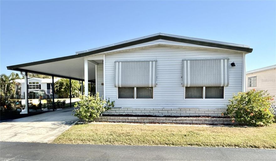 This spacious 2 bed/2 bath 1987 home with more than 1,200 sq feet of living space is ready for new owners to customize the home to meet their needs! The major components are excellent with new HVAC system and ductwork in 2024; newer vapor barrier to protect the subflooring; whole house plumbing in 2015.; water heater is 2014 and is covered by Duke Energy's water heater program and long-lasting roofover has been inspected with no issues. Open floor plan with large living room flowing into the dining room and kitchen. Florida room brings extra space for den, office or extra bedroom. Large guest bedroom has guest bath conveniently located across the hall. Primary bedroom suite has walk-in closet and bathroom with two large storage closets that are cedar lined! Guest bath has tub/shower combo while primary bath has shower only. Washer and dryer in utility closet off kitchen. Ceiling fans throughout home. Carpet throughout with linoleum in kitchen and baths and laminate in enclosed Florida room. Large screened lanai to enjoy the outdoors and large shed for extra storage. This is a true find! Price includes share for the lot and ownership in the co-op. Low monthly maintenance fee of $380 includes water/sewer, trash pick up, lawn maintenance, 24 hr manned gate, private streets and all amenities including clubhouse, fitness center, heated pool, two boat ramps, kayak launch and so much more! Pet friendly 55+ Americana Cove is conveniently located only 10 mins from popular downtown St. Petersburg, 5 mins from 4th St restaurants, grocery and shopping and 20 mins to 2 airports.  Management requires 675+ credit score for each buyer. 2 pets (dogs or cats) up to 35 pds each are welcomed. Renting is allowed with 2 month minimum. This home has great potential!