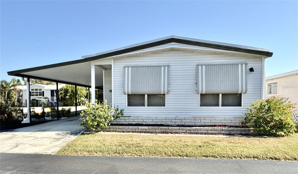 Photo of 6821 Americana Drive NE #106, St Petersburg, FL 33702 (MLS # TB8449805)