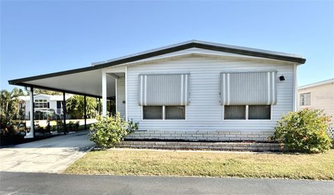 Photo of 6821 Americana Drive NE #106, St Petersburg, FL 33702 (MLS # TB8449805)