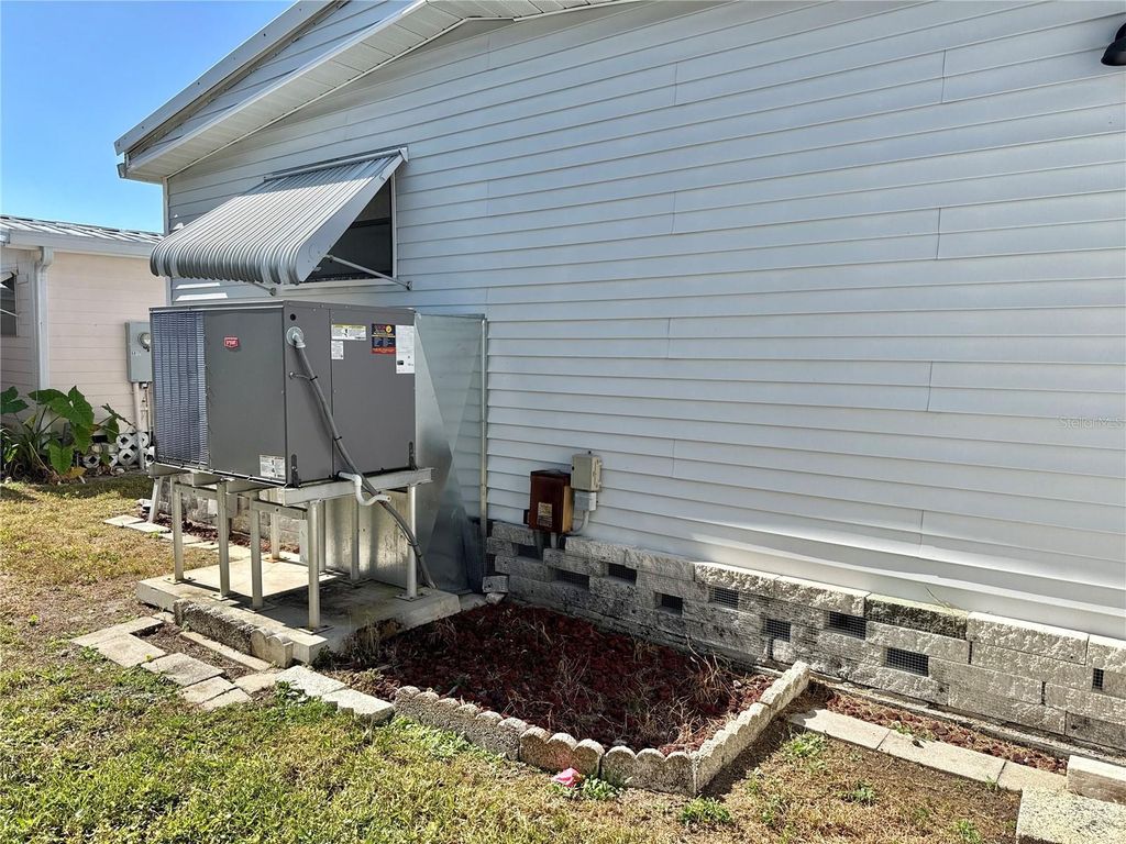 Photo of 6821 Americana Drive NE #106, St Petersburg, FL 33702 (MLS # TB8449805)