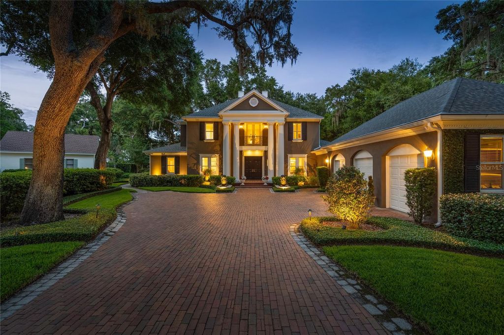 Photo of 5009 Pleasure Island Road, Belle Isle, FL 32809 (MLS # O6408105)