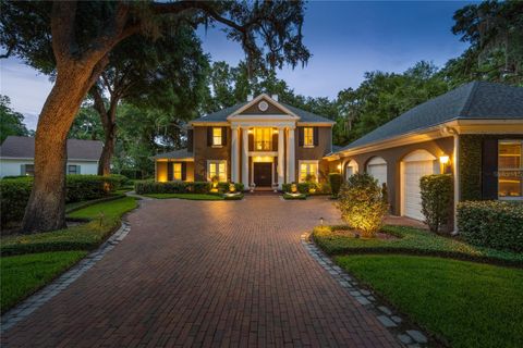 Photo of 5009 Pleasure Island Road, Belle Isle, FL 32809 (MLS # O6408105)