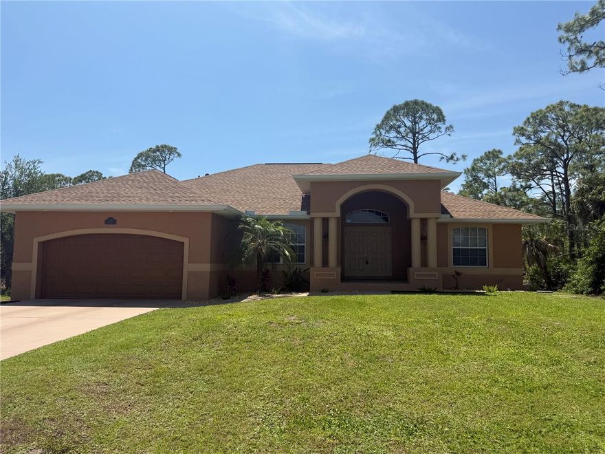 Beautiful 3 bedroom, 2 bath split-plan home located in a peaceful and quiet neighborhood of Port Charlotte.  Built in 2010, this spacious home offers 1,780 sq ft under air on just under a quarter-acre lot.  Features include high tray ceilings, a formal dining room, tile flooring throughout the main living areas, and carpet in the bedrooms.  The kitchen offers solid surface countertops and ample cabinet space.   The spacious primary suite includes walk-in closets and an ensuite bath.   Additional highlights include a 2-car garage, well and septic, and a functional layout perfect for everyday living or entertaining.  Conveniently located near shopping, dining, schools, and Gulf Coast beaches.   Roof, AC, Garage door, and water heater all updated in 2022.  Septic just inspected April 2026, Master bathroom updated 2025.