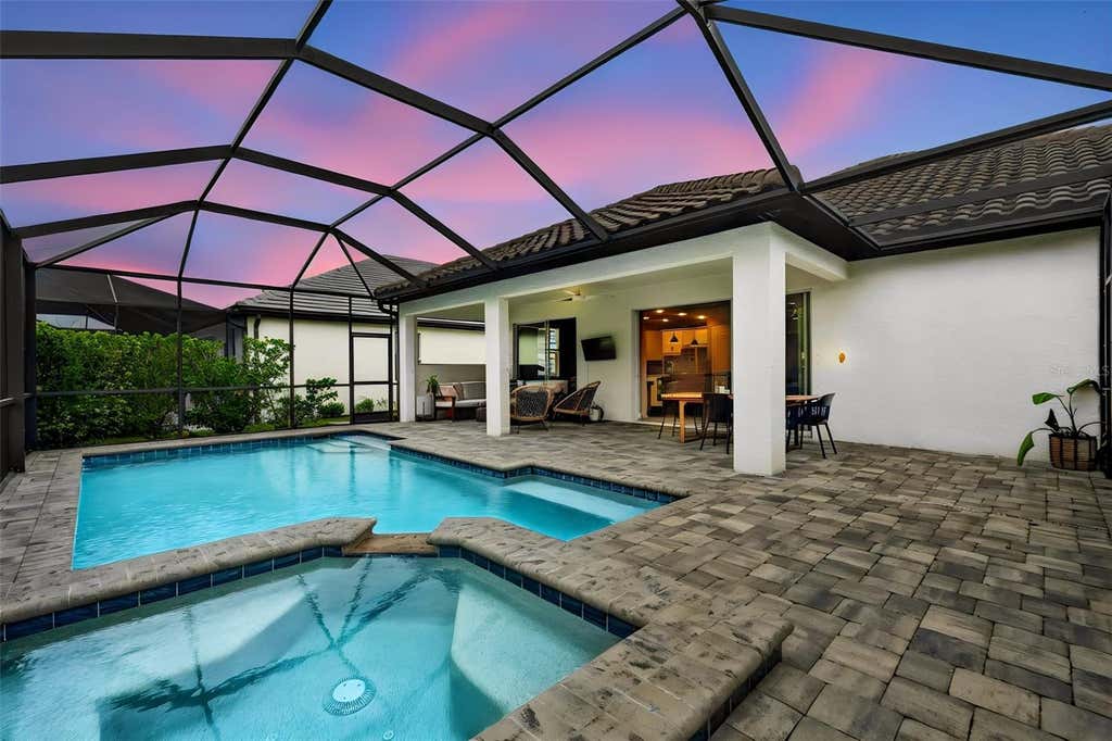 Photo of 2128 Woodleaf Hammock Court, Bradenton, FL 34211 (MLS # A4703357)