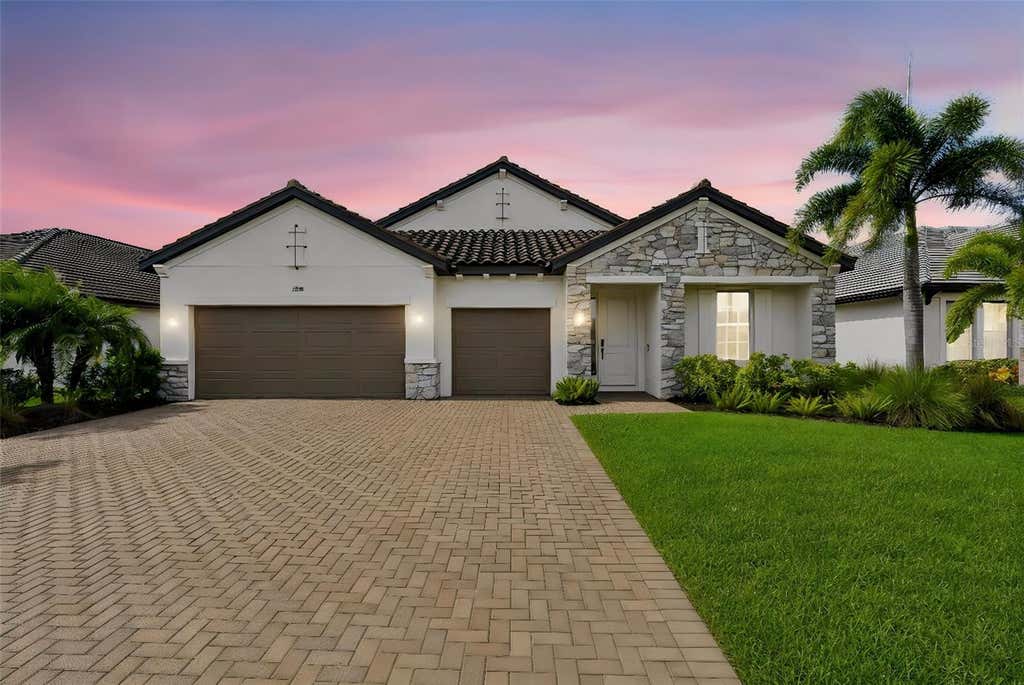 Photo of 2128 Woodleaf Hammock Court, Bradenton, FL 34211 (MLS # A4703357)