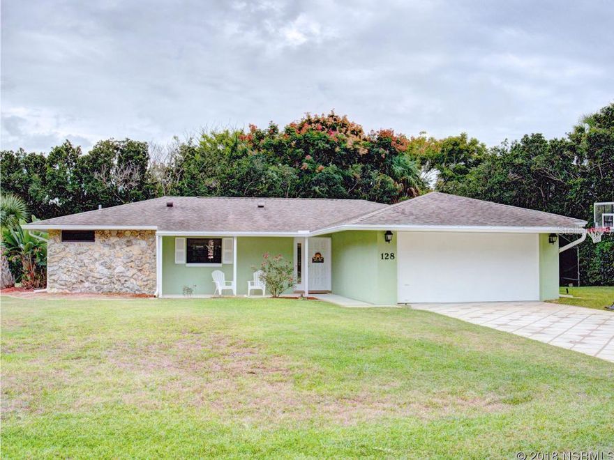 From its architectural shingled roof to the Coquina rock accented corner, this delightful 3 bedroom 2 bath concrete block home is as charming as its picturesque surroundings in the peaceful Corey Estates subdivision and just steps away from the inter-coastal waters of the Indian River. Homeowners in this community enjoy deeded boat access to the river from a private boat ramp and fishing pier which means you can spend the day fishing in some of the best waters in the state. From the moment you enter through the solid wood door, you will admire the crown molding and soft indirect lighting throughout which adds elegance and grace to each room.  The Desirable open split bedroom floor plan is bright and cheerful and offers lots of living space in the living room and dining room areas.  The kitchen has an easy to work in design with ample cabinet and counter space and a breakfast bar perfect for 2.   All 3 bedrooms feature Parquet flooring and the master bath in the cozy master bedroom features a beautifully tiled step in shower.  Adjacent to the living room, is the spacious Florida room. This large, tile floored, air-conditioned room overlooks the vast private back yard and patio that features a custom cement design, which matches the driveway, and is partially covered with a charming pagoda making it perfect for relaxing after a long day or for entertaining friends and family.  The beautiful 125 X 125 LOT is adorned with magnificent native foliage and the whole yard stays plush and green with the well sprinkler system.  Other features include the large finished shed with electric and dehumidifier and plenty of room for parking your RV, boat, or ATV in addition to the 2 car garage. ;Water: City
