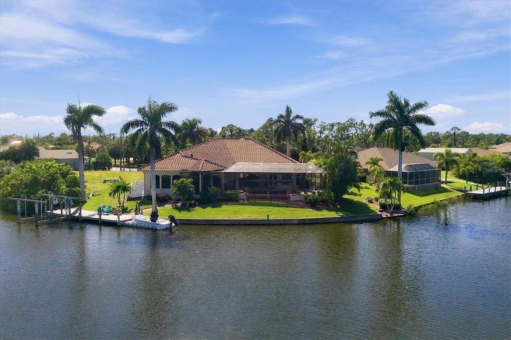 Photo of 15728 Aldama Circle, Port Charlotte, FL 33981 (MLS # D6149309)