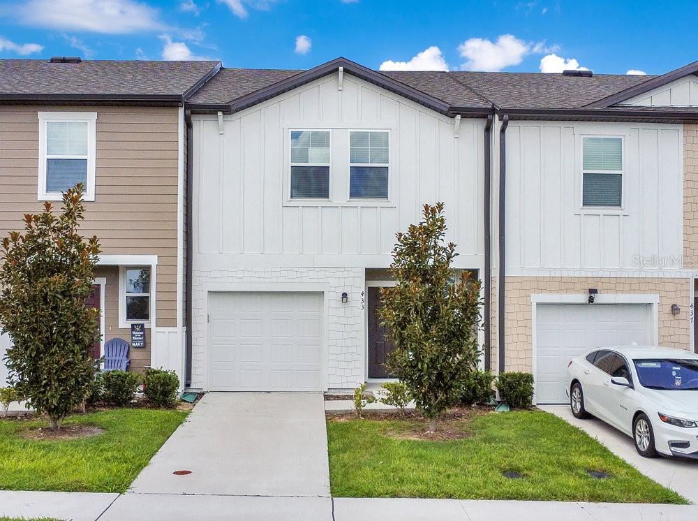 MOVE-IN READY and stunning 3-bedroom, 2.5-bath townhome is now available for rent in the quiet & desirable Madison Place community! This spacious unit offers an open-concept layout with over 1,400 sq ft, a modern kitchen featuring stainless steel appliances, granite countertops, and no rear neighbors. Upstairs you’ll find a generous primary suite, walk-in closet, and double sinks. Not to mention two guest bedrooms and a full laundry room with washer and dryer included.
The home also includes a one-car garage, and energy-efficient double-pane windows. Community amenities include a resort-style pool, playground, and green spaces. Lawn care & trash pickup is included in rent. Conveniently located near Posner Park, I-4, Hwy 27, shopping, dining, and Disney. Schedule your tour today!