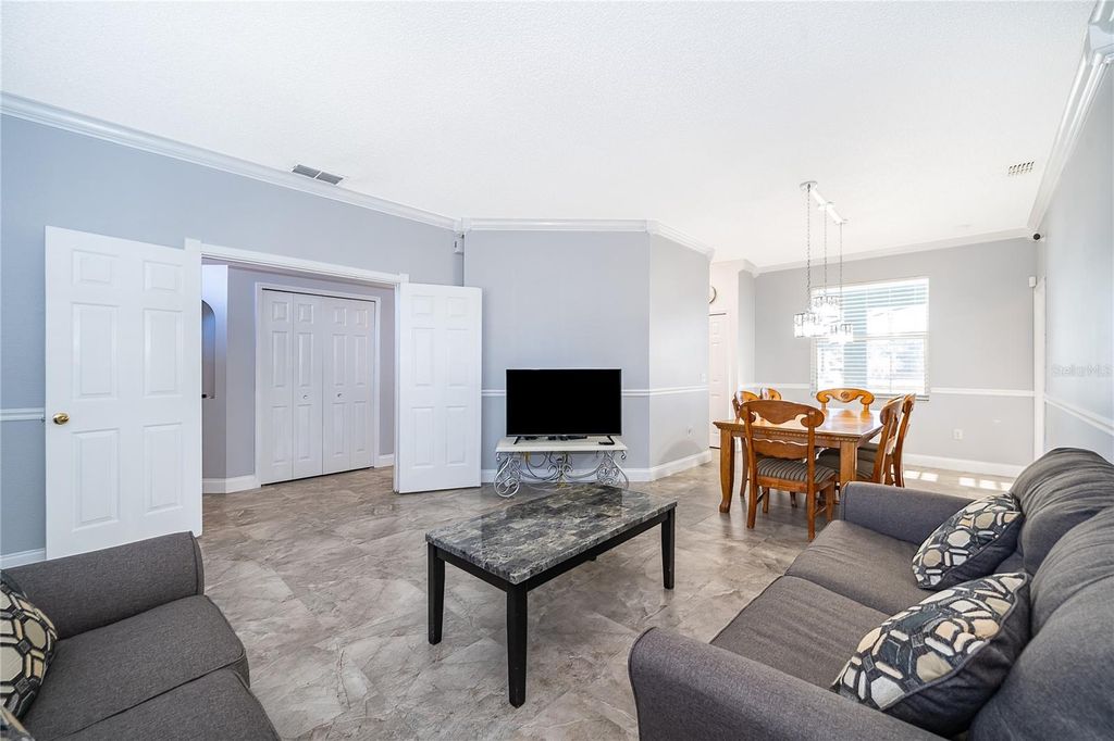 Photo of 5323 Coral Vine Lane, Kissimmee, FL 34758 (MLS # S5142876)