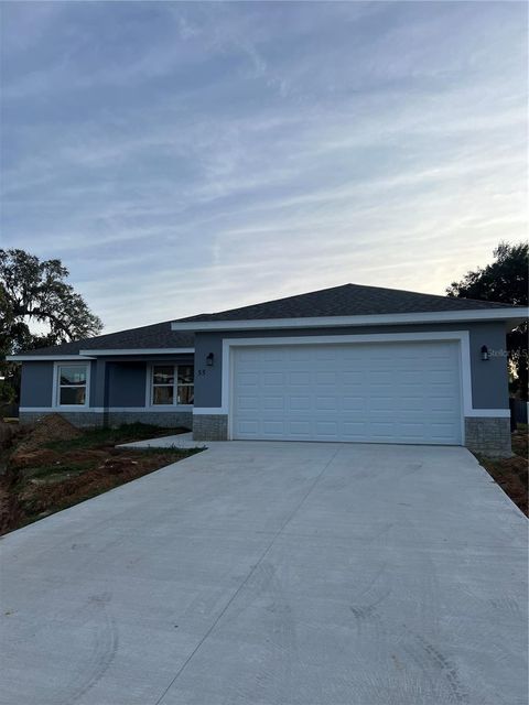 Photo of 55 NW 45th Loop, Ocala, FL 34475 (MLS # OM711834)