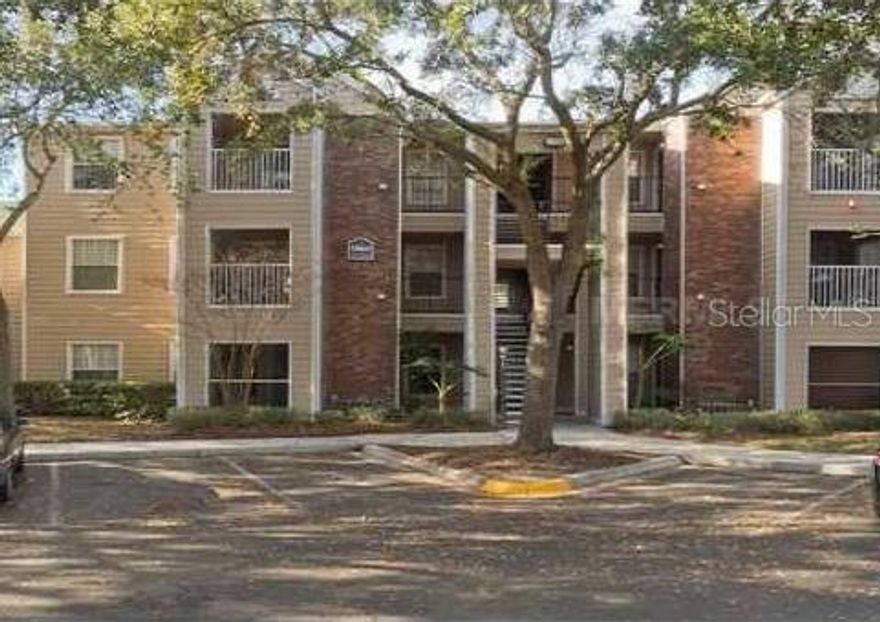 Beautiful upgraded 1st floor Condo. Spacious open plan living/dining/kitchen with  Wood cabinets in the kitchen and dark wood and ceramic tile floors throughout.  The unit features a laundry room with a Full-size Washer and Dryer and there are two master suites with full bathrooms and walk-in closets. The Screened-in patio overlooks a serene pond and a beautiful fountain affording a lovely waterfront view. 
Park Central, is an exclusive gated resort-style community offering the perfect blend of security, convenience, and endless amenities. This premier neighborhood features a brand-new, multi-level fitness facility spanning over 5,000 square feet, complete with a complimentary on-site athletic director, yoga and aerobics studios, and a full indoor basketball court as well as a Community store for the convenience of the residents.
Enjoy a lifestyle filled with recreation and relaxation — five sparkling private pools, two lighted tennis courts, and a movie screening room with plush seating. Meet friends at the on-site sports bar and full-service restaurant, unwind in the movie screening room with plush seating, or take a peaceful stroll along the waterside boardwalk areas. Park Central boasts 24-hour manned gate security, residents can enjoy peace of mind and privacy while staying just minutes from The Mall at Millenia, Universal Studios, and Orlando’s best dining and entertainment destinations.
