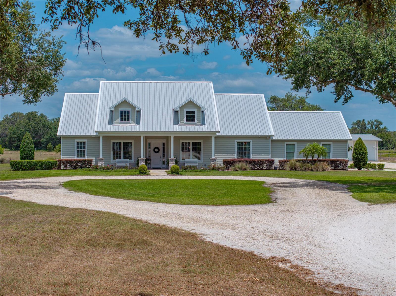 Discover your own slice of paradise at 3805 Mammoth Grove Rd! If you're looking to move to the quiet country, this home is just for you! This beautiful property spans 5 acres of lush land and features a meticulously maintained home custom designed for comfort and relaxation. With 3 bedroom, 3 bathrooms, you will enjoy the generous floor plan with ample natural light, a cozy living room, and a warm kitchen equipped with modern appliances, granite countertops throughout, screened in lanai, and so much more. Step outside to your expansive yard, perfect for gardening, entertaining, or simply enjoying the serene surroundings. Enjoy the mature oak trees that brings Old Florida vibes to this property. Bring your animals! Plenty of room for your farm animals. A standout feature of this property is the large 34x39 shop, ideal for hobbyists or entrepreneurs. With three bays, it provides plenty of space for vehicles, boats, equipment, or projects. Experience the beauty of Florida’s wildlife in your own backyard. Wild turkey and deer are frequent visitors to this property. Located near Lake Wales, you’ll have easy access to local shops, restaurants, and outdoor activities, while still reveling in the tranquility of country living. This property is perfect for those looking to escape the hustle and bustle of city life while still enjoying modern comforts. Schedule a viewing today and imagine the possibilities!
