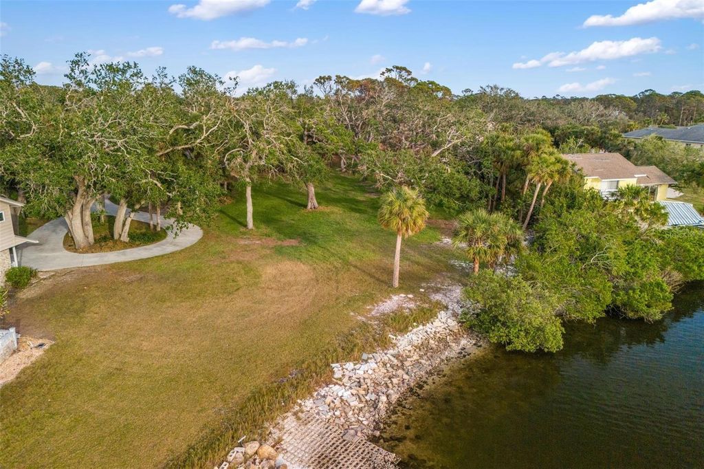 Photo of 1990 Bayshore Drive, Englewood, FL 34223 (MLS # D6139751)