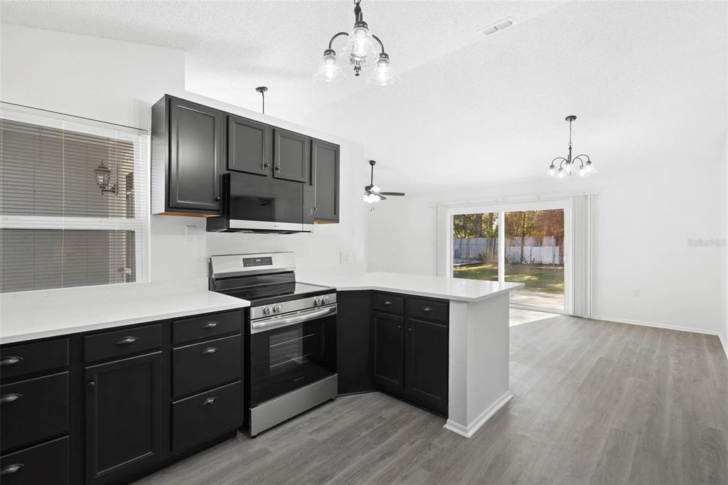 Photo of 3031 Malcolm Drive, Deltona, FL 32738 (MLS # O6368220)