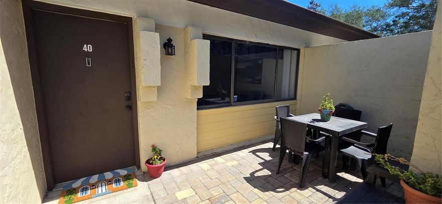 With its great location, tasteful updates, and secure GATED access, this stylish, fully furnished 2-bed, 2-bath condo in the gated Grantwood community is a perfect fit for healthcare professionals or the University community. Located just minutes from UF Health Shands, the VA, and the UF campus, the home features a bright, split-level layout with durable laminate and tile flooring—absolutely no carpet. Recent upgrades include a 2020 AC unit and modern kitchen appliances. First floor laundry closet includes washer/dryer. Enjoy community perks like a pool, shaded lounge area, racquetball courts, and gated security, all while being steps away from direct bus routes to campus and Butler Plaza shopping and dining.