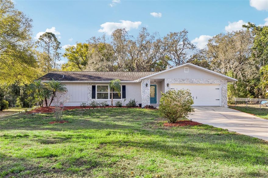 Welcome to your move-in-ready sanctuary in Palm Harbor, FL with no HOA or CDD fees! This 4BR/2BA pool home sits on nearly a half-acre and has been updated from top to bottom. New AC, new water heater, new hurricane windows and slider doors, new stainless-steel range, refrigerator, and dishwasher. A new washing machine is included! The kitchen features 42” cabinets and granite island. Enjoy the Florida sun in your massive backyard or lounge by the pool protected by a vaulted screen enclosure (1-year-old pump, brand-new filter, and new lighting). Freshly painted and trimmed with crown molding, this home features a cozy wood burning fireplace and a guest bath that doubles as a pool bath. Located in the coveted Palm Harbor University High zone, just minutes from the beach and downtown. Bring the boat, the RV, and start living the dream! Schedule your showing and submit your offer before it's gone!