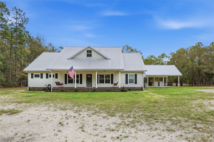 Enjoy peaceful country living on 10.01 private acres in Columbia County! This spacious 3-bedroom, 2-bath home plus a dedicated office offers 2,215 H/C square feet with a comfortable layout perfect for both everyday living and working from home.
 2 Car Carport with additional storage above. Approximately 7-8 Acres of Planted Pines for future Income.
Surrounded by nature, the property provides excellent privacy and abundant wildlife, making it ideal for those who appreciate quiet rural living. The land offers plenty of room for gardening, recreation, animals, or simply enjoying the outdoors.
A Large 40 X 60 pole barn provides excellent space for equipment storage, hobbies, or workshop use. With acreage and natural surroundings, this property combines functionality with the beauty of North Florida countryside living.
Whether you’re looking for a private homestead, hobby farm potential, or a peaceful retreat, this property offers the space and freedom to make it your own. Call today for a Tour of this beautiful home.