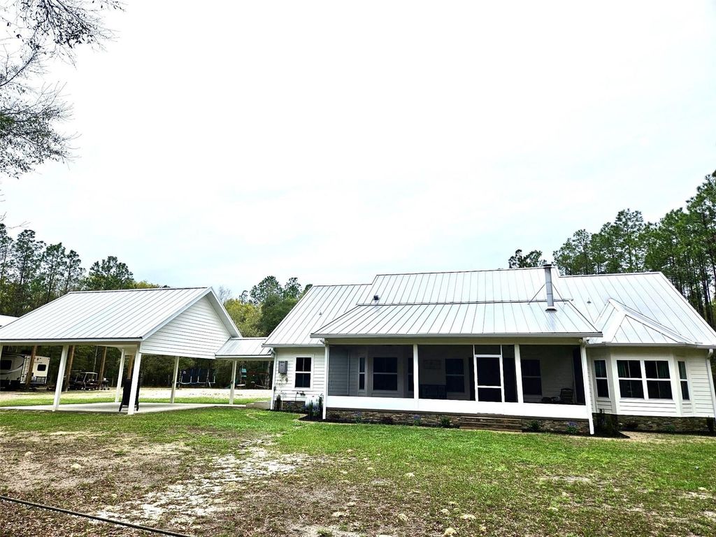 Photo of 357 SW Conestoga Way, Fort White, FL 32038 (MLS # GC538414)