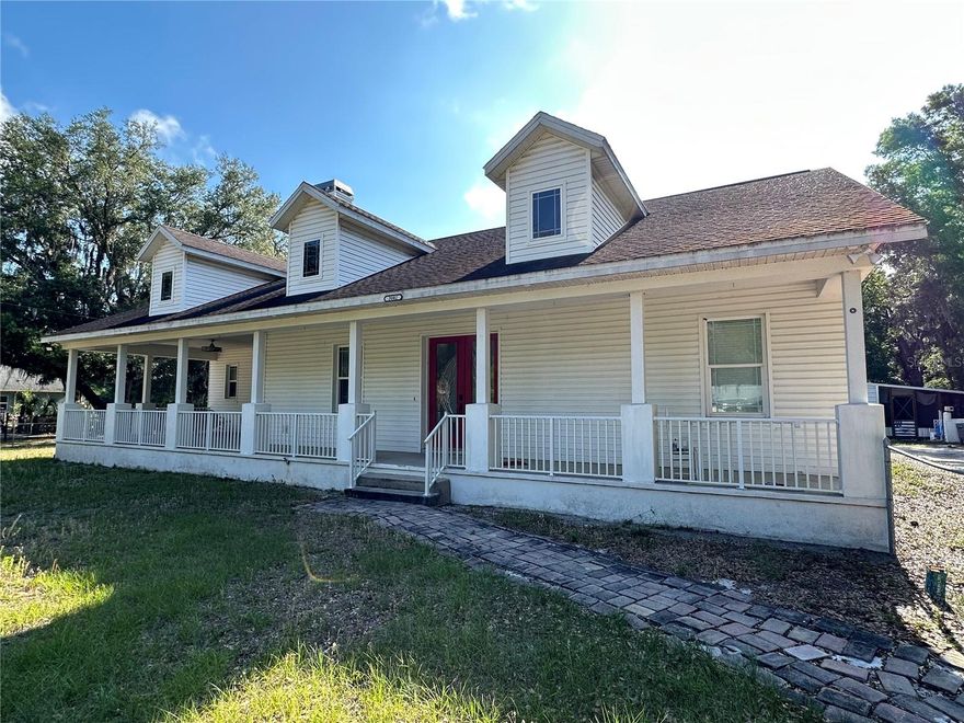 Tucked away on a dead end street in rural Plant City this 4/3 home sits on nearly 1/2 an acre and offers plenty of space, along with tons of potential provide a little TLC to make this home your own. The split floor plan features double primary suites, high ceilings, an open living area, and absolutely zero carpet throughout. Tile and laminate run through the main areas while both primary bedrooms feature hardwood floors. The kitchen includes granite countertops, stainless steel appliances, dual built-in ovens, and a gas cooktop. This home features 3 wood burning fireplaces - one in the living room, one in the family room, and one on the front porch outside the primary bedroom that creates a unique space to enjoy on cooler nights. Additional features include a gas tankless water heater, well and septic, propane tank, and a screened back patio overlooking the spacious backyard. A solid opportunity for someone looking for privacy, space, and the chance to make it their own. Call today for your private showing. No sight unseen or assignable offers.