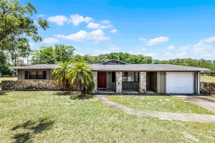 Located in beautiful Seminole County and highly desirable community of Chuluota Florida. The property includes 2 parcels (27-21-32-300-0005B-0000 and 27-21-32-300-005D-0000) which combined is 4.89 acres. This unique opportunity boasts high and dry land perfectly nestled among a beautiful oak hammock, state forest, with a serene, flowing creek that runs through the property, this one-of-a-kind retreat would provide the ideal setting for your dream home. Located off State Rd 419, you are just minutes from Oviedo, and the 408. Highly rated Seminole County schools, UCF and Seminole State college are also nearby. Hiking trails, parks and lots of outdoor activities are nearby and waiting to be explored. The property does have an existing 3 bedroom, 2 bath home and built-in swimming pool. The home on well/septic, provides a foundation for complete renovation or removal to build your custom dream home. Additional large (30 x 60) 3 bay barn with plenty of room for an RV, Boat(s), and other recreational toys.