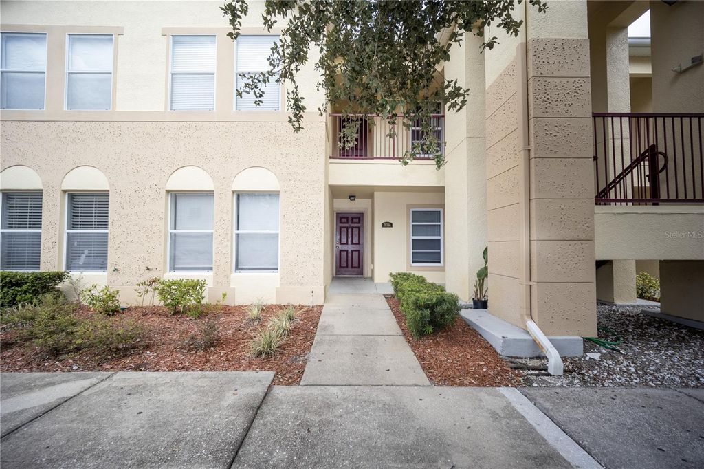 Photo of 2814 Club Cortile Circle #A, Kissimmee, FL 34746 (MLS # S5137048)