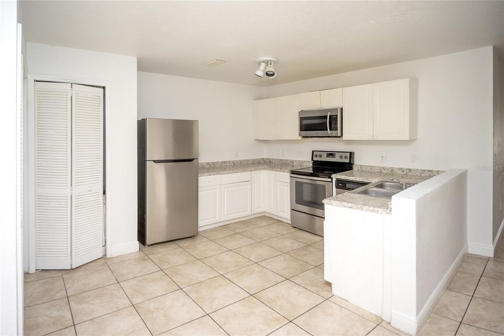 Photo of 2814 Club Cortile Circle #A, Kissimmee, FL 34746 (MLS # S5137048)