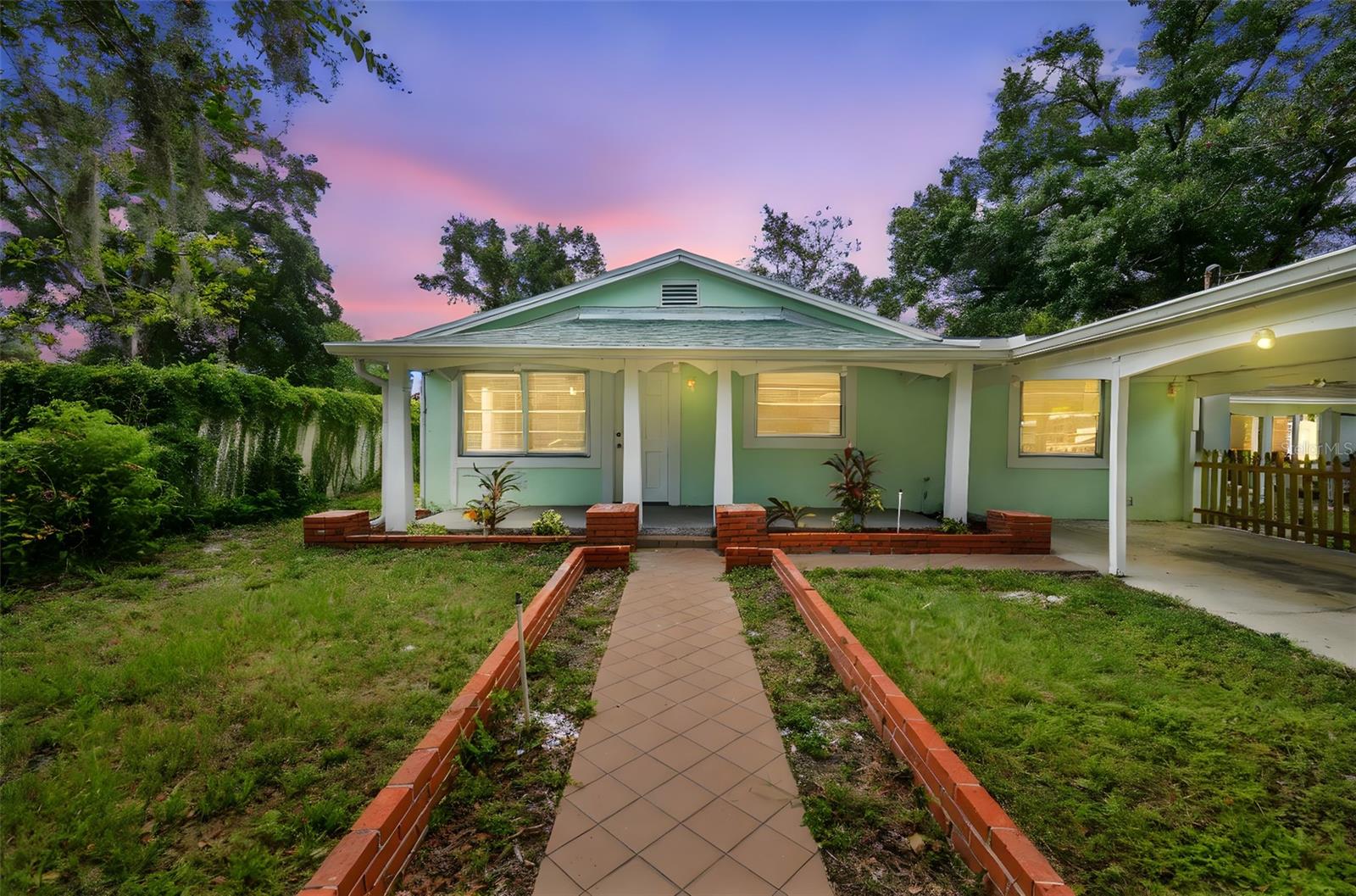 Income Producing or Family Compound in Tampa!
Up for sale is this well-maintained multi-unit dwelling situated on an oversized 100x130 lot, offering versatile living options—ideal as a family compound or as a strong income-producing investment. The main home has been divided into two units, one featuring two bedrooms, one bath, a full kitchen and living room, and the other offering one bedroom, one bath, and a kitchen/living combo. In addition, there are two accessory dwelling units in the back: one is a one-bedroom, one-bath studio and the other is a two-bedroom, one-bath. Property features include two storage sheds, an enclosed shared laundry area with washer/dryer hookups, covered parking, ample additional parking, and a central courtyard with a fireplace. All units have been updated with new flooring, fresh paint, and modern kitchens, and the roof was replaced in February 2023. This property is conveniently located near Raymond James Stadium, Downtown Tampa, Seminole Heights, Tampa Heights, Tampa International Airport, Florida’s Gulf beaches, and major interstates. Whether you are looking for a turnkey rental investment or a private family compound, this property is ready to deliver.