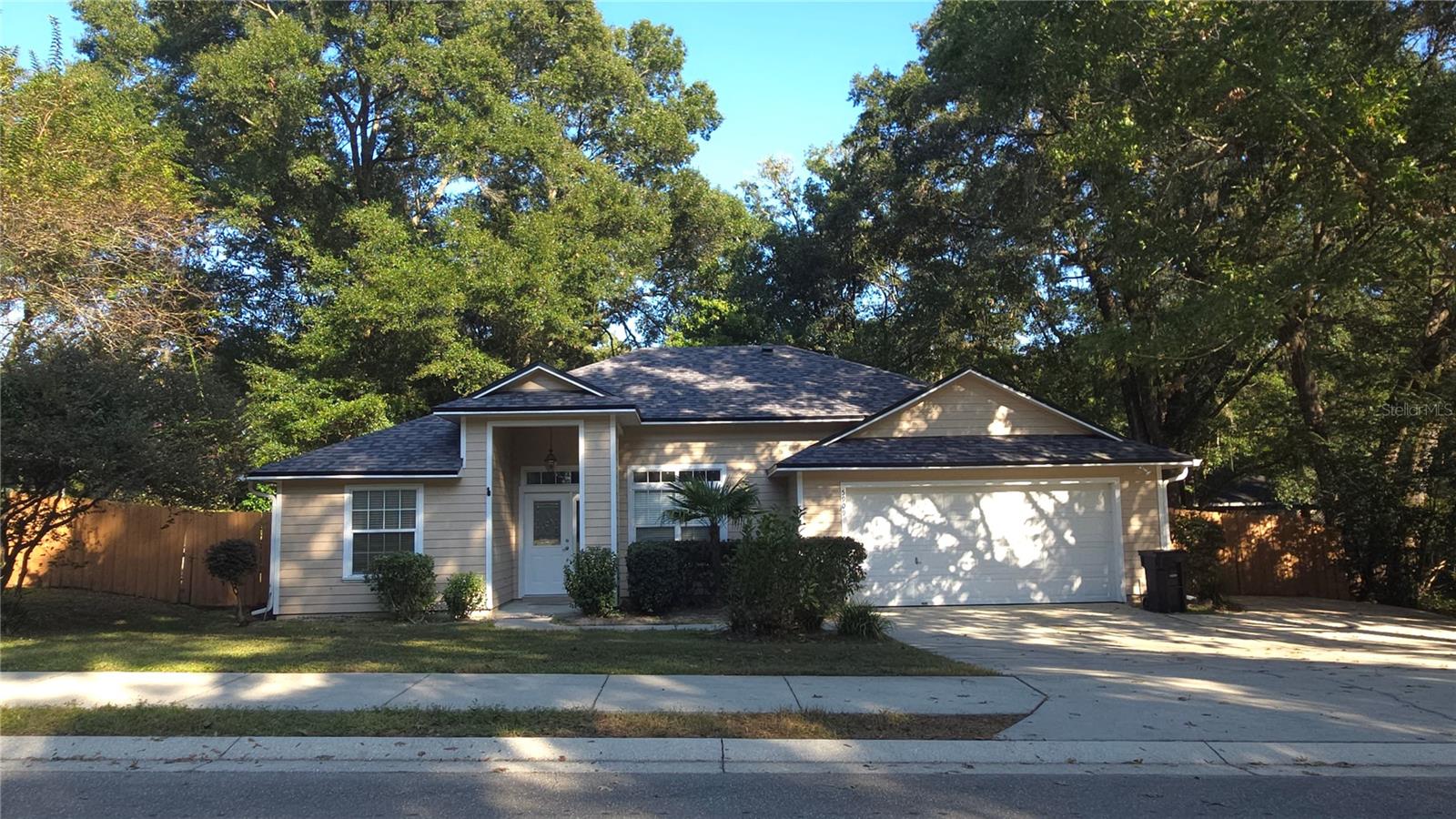 Welcome to this charming 3-bedroom, 2-bath home with an office, located in the highly sought-after Hickory Forest subdivision — known for its low HOA fees and friendly community featuring a pool, tennis court, and playground.
Enjoy peace of mind with major updates already completed: new roof (2023), new HVAC (2024), and fresh interior paint. The kitchen and bathrooms were tastefully remodeled in 2016 with granite countertops and solid wood cabinetry. The office includes built-in desk and shelving, offering the perfect workspace or study area.
The home’s open, bright floor plan is ideal for comfortable family living and entertaining. Step outside to a spacious backyard, perfect for playsets, weekend barbecues, or a vegetable garden. The screened wood deck provides a cozy, bug-free space to relax and unwind.
Located just minutes from UF/Shands, Celebration Pointe, Butler Plaza, I-75, and local parks — this home offers both convenience and comfort.  Don’t miss this move-in ready gem — schedule your showing today!
