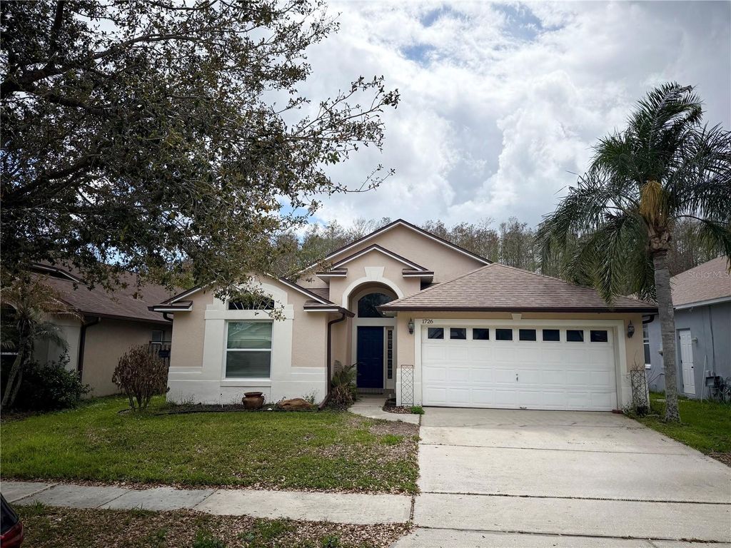 Photo of 1726 Nestlewood Trail, Orlando, FL 32837 (MLS # O6409221)