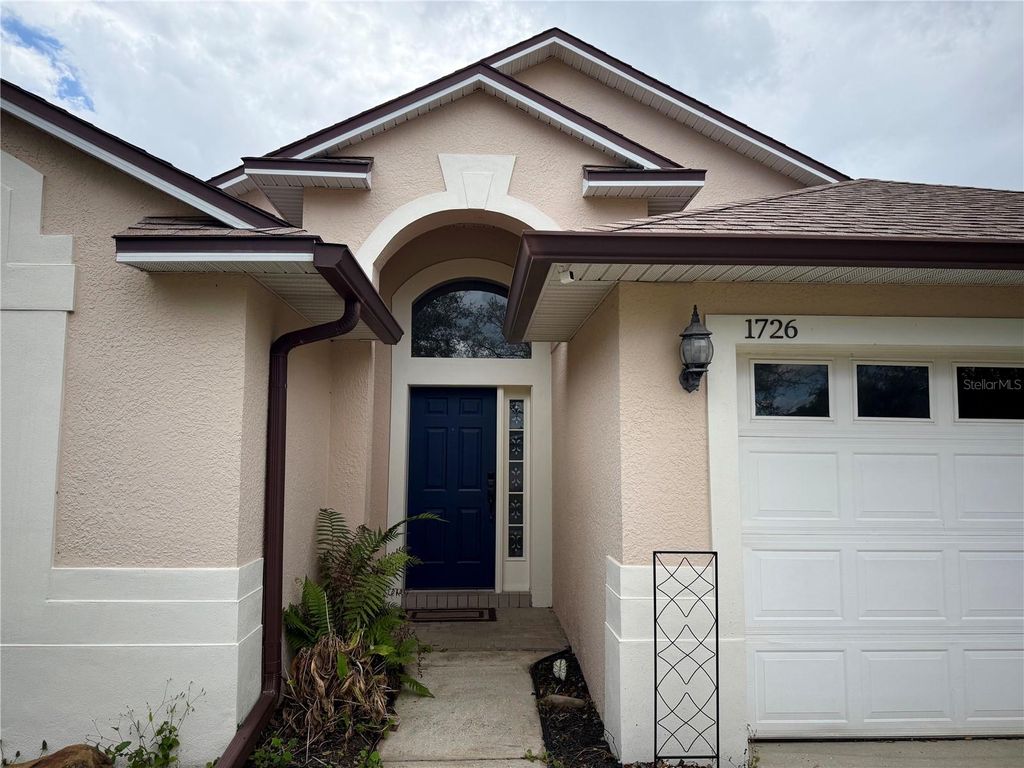 Photo of 1726 Nestlewood Trail, Orlando, FL 32837 (MLS # O6409221)