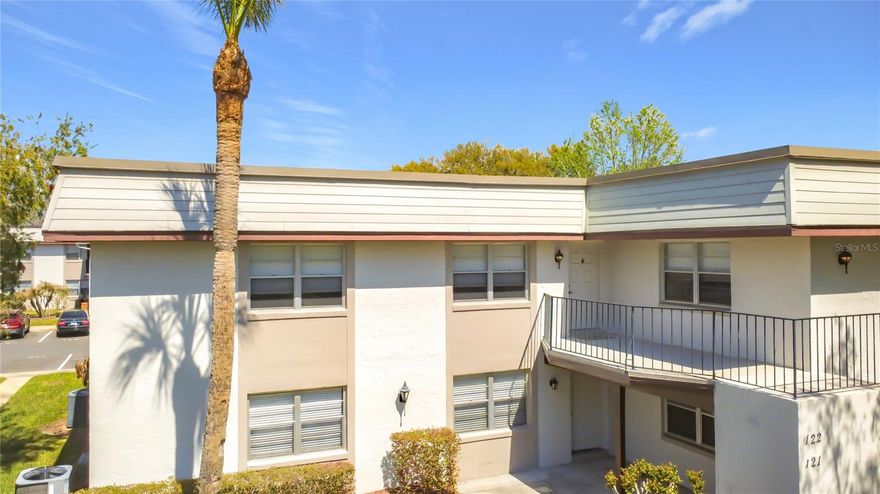 You found it!! Beauty in Winter Garden!  Sought after location near downtown Winter Garden!  This Windtree 2/2 condo on the 2nd floor has been totally & BEAUTIFULLY REMODELED in 2026 as follows! BRAND New Wood laminate flooring in living room & bedrooms. Kitchen has BRAND NEW farmhouse porcelain sink with floating butcher block shelves, shaker moss cabinets with brushed gold handles and faucet & exquisite quartz counter tops with marble herringbone backsplash. BRAND NEW Frigidaire stainless steel appliances. 3k in upgrades for recessed lighting. BRAND NEW Frigidaire Stackable washer & dryer with convenient according door being installed as well! Unit has own private storage under stairs (approx. 4X9 perfect for bicycles etc.) 
Community Pool & basketball court.