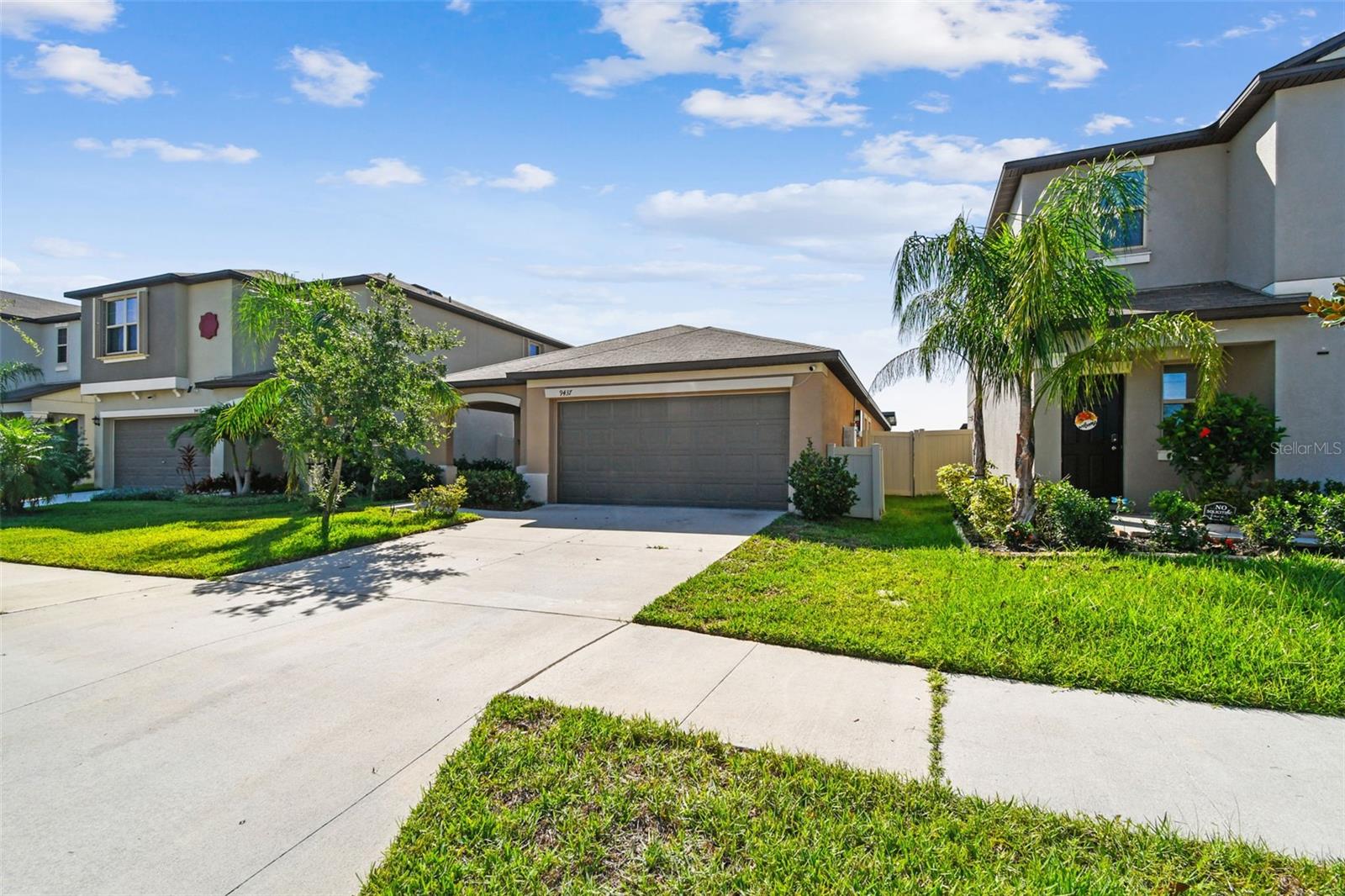 Welcome to 9437 Lemon Drop Loop — a beautifully maintained 3-bedroom, 2-bathroom home offering 1,451 square feet of thoughtfully designed living space in the heart of Sun City Center. Built in 2022, this move-in-ready gem sits on a premium lot with peaceful pond and conservation views, creating a serene backdrop right in your backyard.
This home is packed with value and upgrades! Enjoy Tesla solar panels for energy efficiency ALREADY PAID IN FULL, along with a paid-off whole-home water filtration system and reverse osmosis, giving you clean, crisp water from every tap. Inside, you’ll find tile flooring throughout—that’s right, no carpet anywhere! The split-bedroom layout provides privacy, while the open-concept kitchen and living areas are perfect for both relaxing and entertaining. To top it off, you get to enjoy that indoor/outdoor Florida lifestyle with an extended 600 square foot screened in lanai overlooking the water view of the pond to the rear of the home.
Low HOA fees make this home even more attractive, and you’re just a short drive to Tampa, St. Pete, and Sarasota—all within 30 minutes to an hour. Whether you’re commuting or heading out for weekend adventures, the location can’t be beat.
Seller is very motivated—don’t miss your chance to own this energy-efficient, low-maintenance home with beautiful water views!
