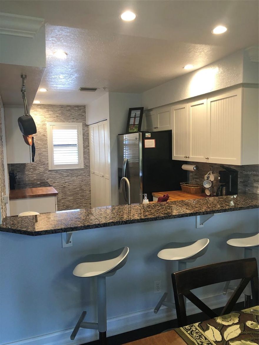 BEAUTIFUL REMODELED INTRACOASTAL COMMUNITY CONDO WITH BEAUTIFUL LAMINATE FLOORS, GRANITE COUNTERTOPS IN NEW KITCHEN WITH STAINLESS APPLIANCES AND MUCH MORE.  THIS UNIT IS OFFERED TASTEFULLY FURNISHED AND IS MOVE IN READY. YOU MUST SEE TO APPRECIATE.
GREAT OUTDOOR FIRE PIT, STAINLESS BUILT-IN GRILLING AREA. AND COVERED PATIO RIGHT ON THE INTERCOASTAL WITH VIEWS OF THE LIGHTHOUSE, DISAPPEARING ISLAND AND THE COAST GUARD STATION. OTHER AMENITIES INCLUDE KAYAK STORAGE, LIGHTED TENNIS COURTS AND GAS HEATED POOL. 
BOAT SLIPS ARE AVAILABLE (WAITING LIST) TO LEASE ON A LONG TERM BASIS.

THIS UNIT WILL NOT LAST ;Water: City