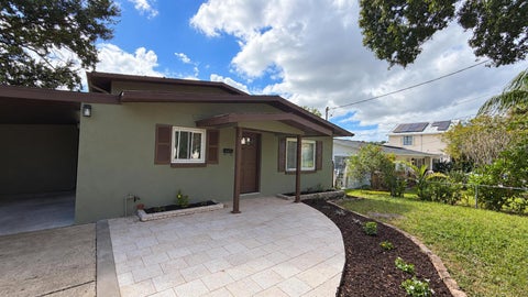Photo of 328 W Comanche Avenue, Tampa, FL 33604 (MLS # O6453920)